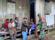 Peduli Kesehatan Warga Binaan, Babinsa Koramil 1710-06/Agimuga Dampingi Nakes Bagikan Kelambu Berinsektisida