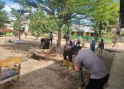 Polres Lhokseumawe Bersama BKO Brimob Kaltim Gotong Royong Bersihkan MIN 21 Aceh Utara Pasca Banjir