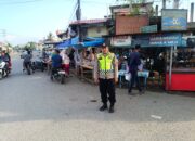 Polsek Muara Dua Laksanakan Pengamanan dan Pengaturan Lalin Jelang Berbuka di Simpang Elak dan Kandang