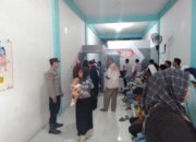 Polsek Muara Satu Amankan Penyaluran Dana Stimulan Korban Banjir di Batuphat Timur, Proses Berjalan Tertib dan Kondusif