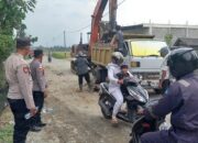 Kapolsek Meurah Mulia Ipda Mukhlis, S.H Beserta Jajarannya Laksanakan Pengamanan Pengerukan Saluran Irigasi