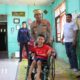 Wujud Kepedulian, Kapolres Lhokseumawe Berikan Kursi Roda dan Santunan untuk Dua Anak Penyandang Disabilitas